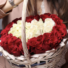 Basket with red and white heart-shaped rose photo
