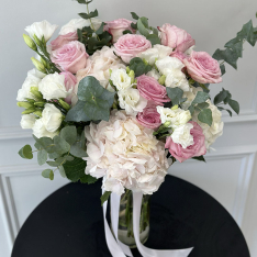 A designer bouquet from a florist in delicate tones photo