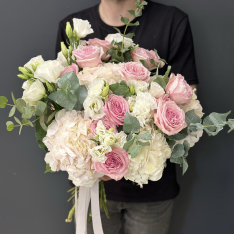 A designer bouquet from a florist in delicate tones photo